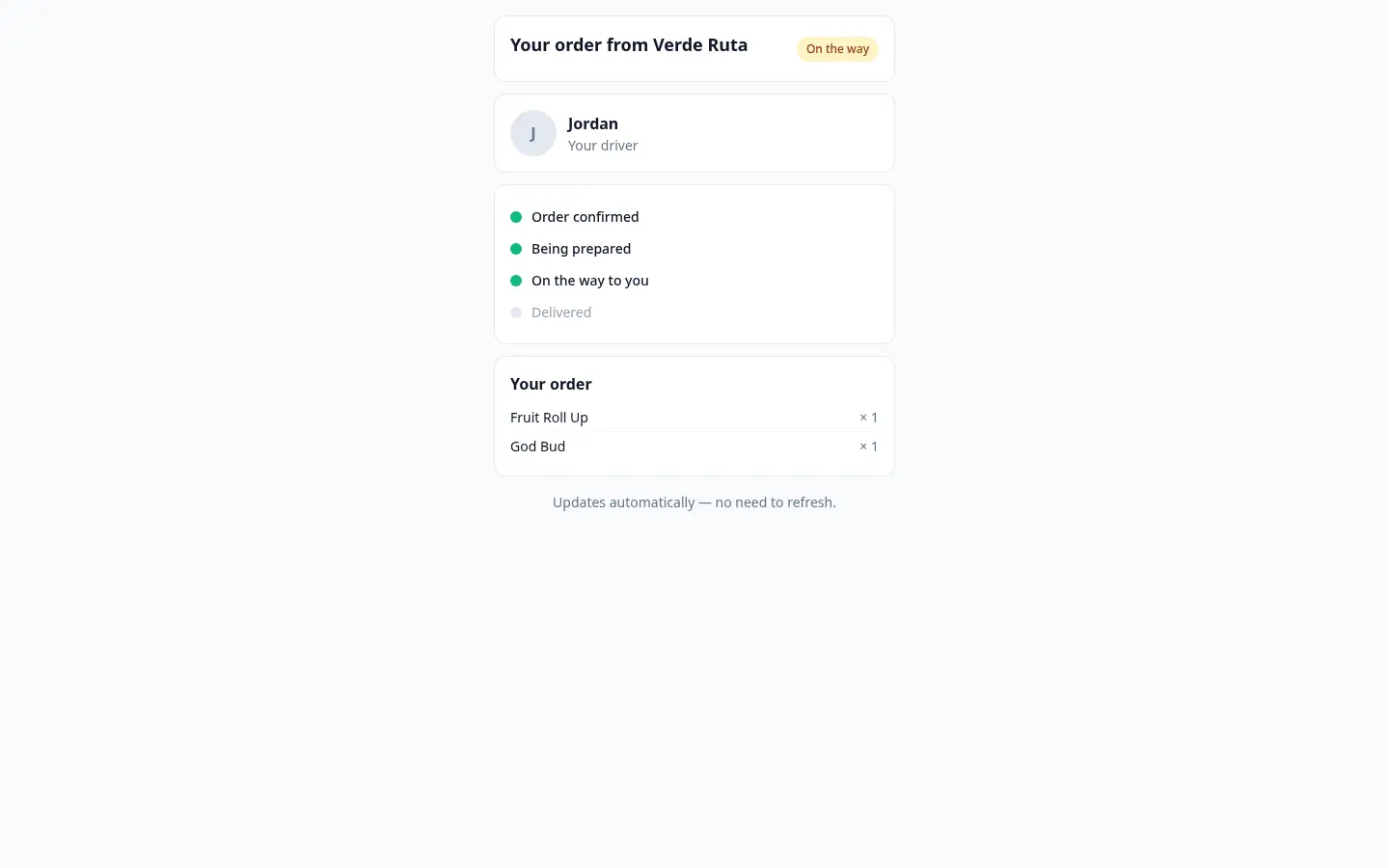 The delivery tracking page showing a live status timeline, the estimated arrival time, and the order's items